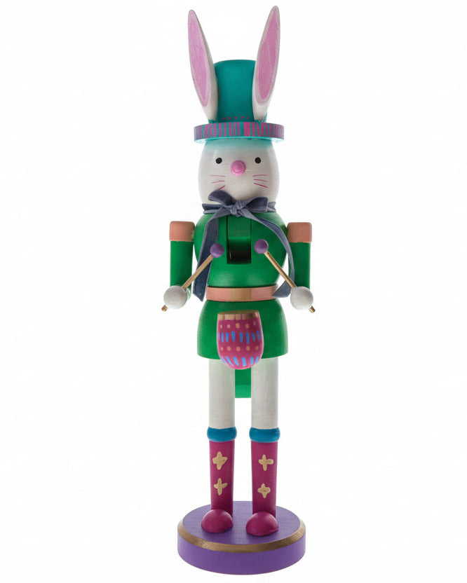 Colorful Easter bunny nutcracker figurine painted by Phoenix artist Julie Hamiltonon a white background