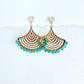 Gold and green onyx earrings with cubic zirconia stud on a white background by artist Julie Hamilton