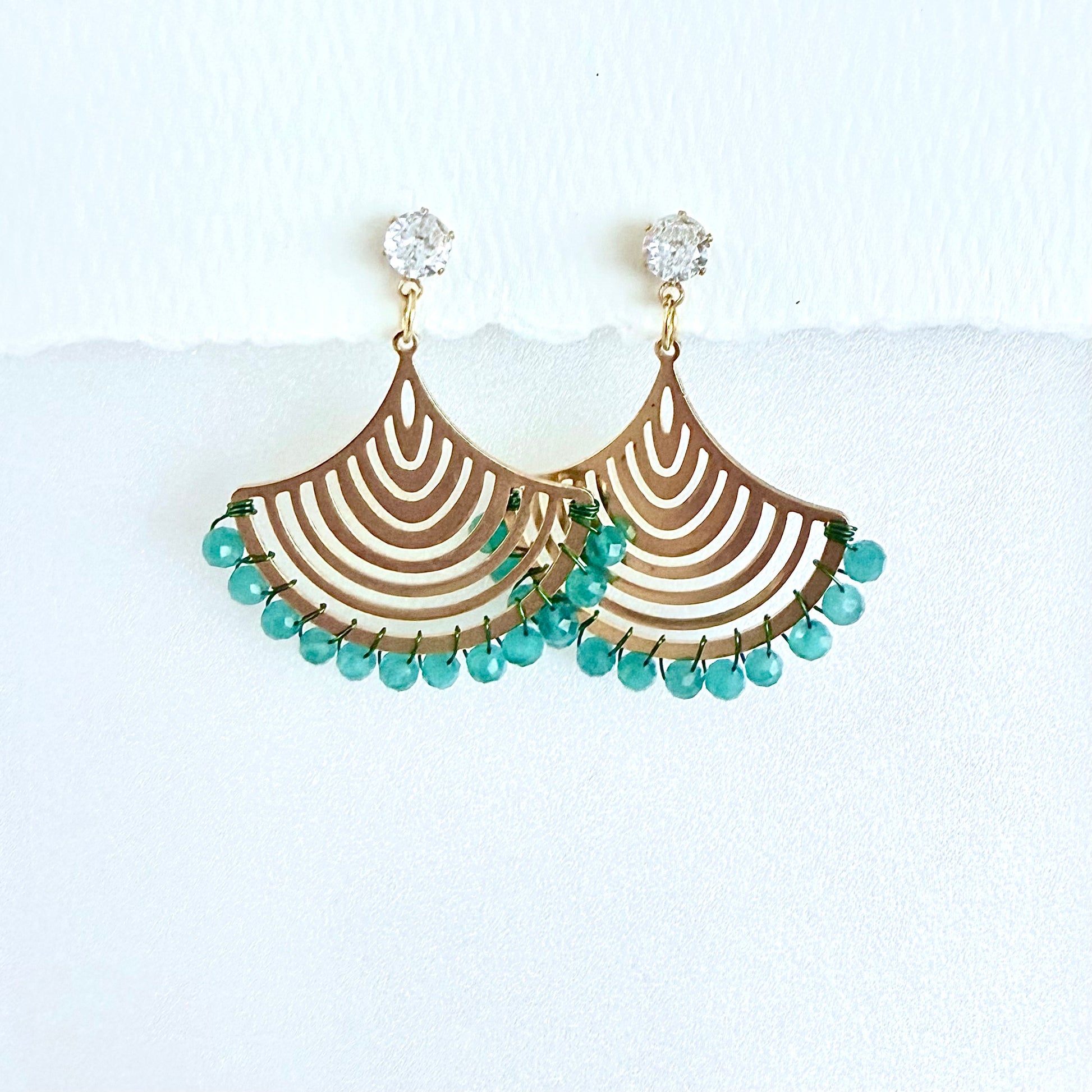 Gold and green onyx earrings with cubic zirconia stud on a white background by artist Julie Hamilton