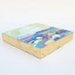 A small colorful abstract landscape painting with gold leaf edges by phoenix artist Julie Hamilton
