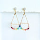 Colorful gemstone beaded teardrop earrings in gold on a white background by Phoenix artist Julie Hamilton