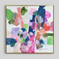 An abstract framed painting featuring a vibrant mix of brushstrokes in pink, green, blue, purple, orange, and beige on a white background, enclosed in a thin gold frame.