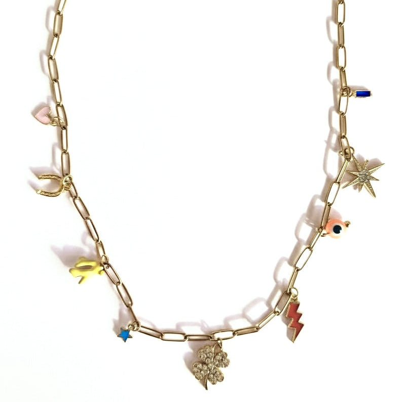 Necklace with various lucky charms on a white background