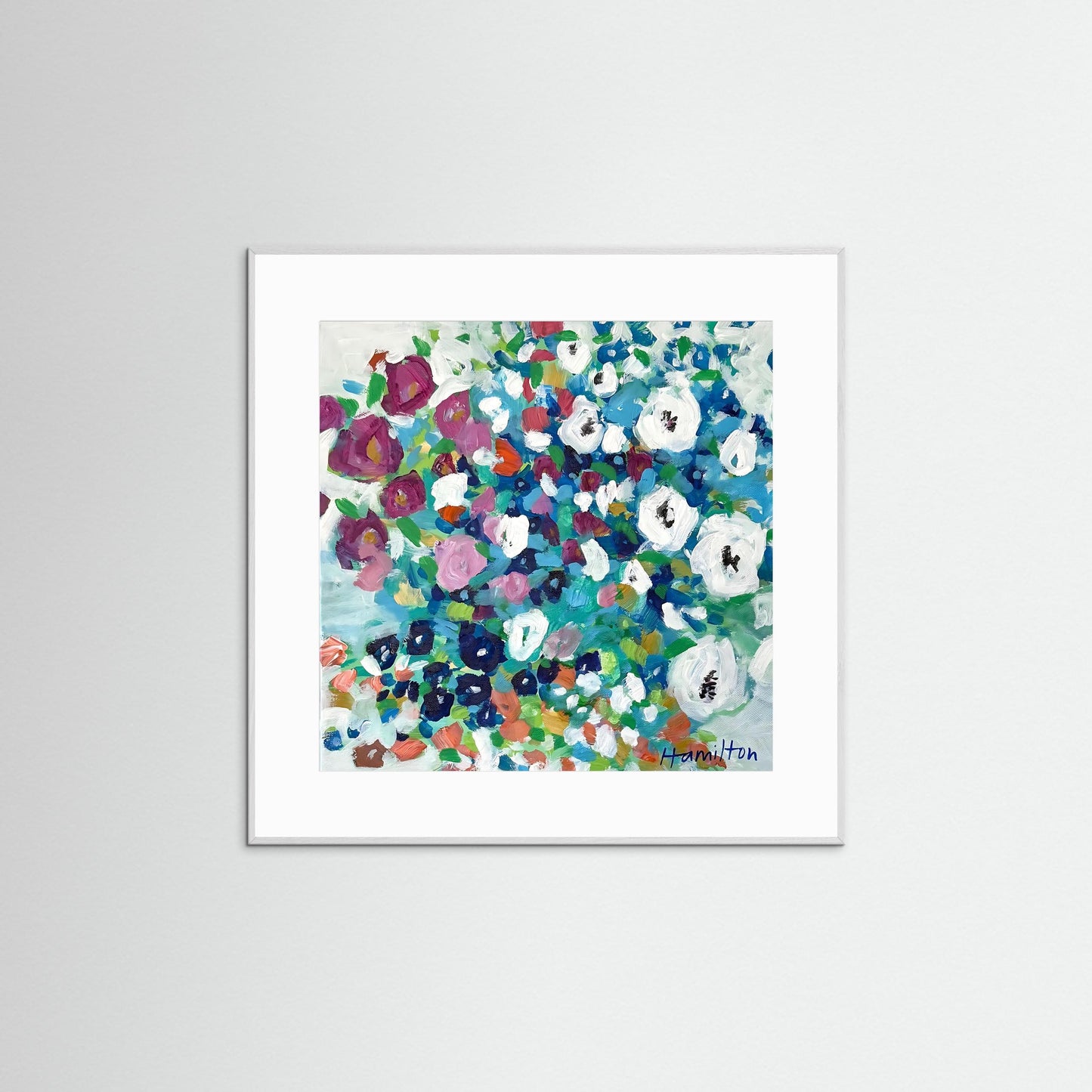 Framed floral art print with colorful flowers on a white background