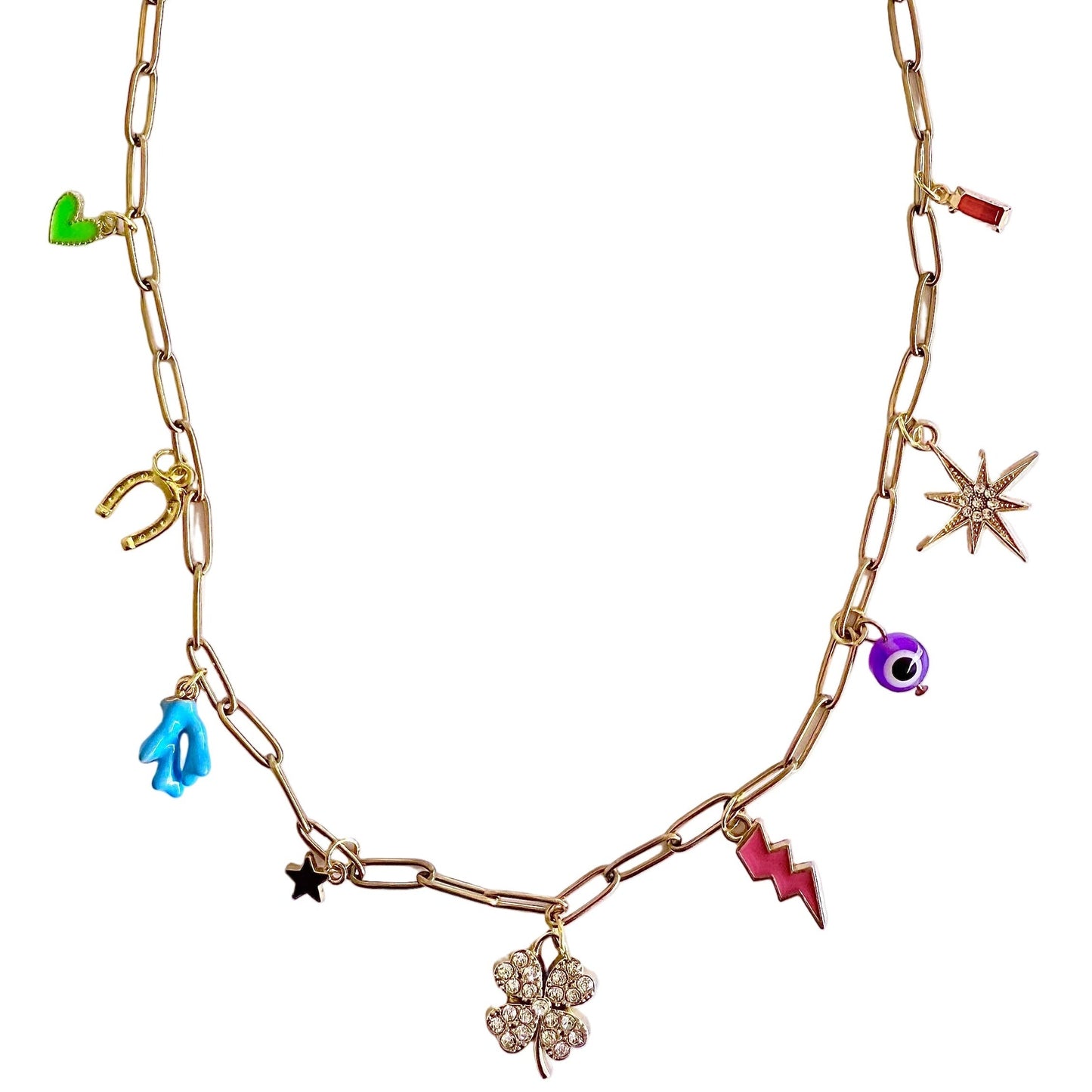Gold chain necklace with various charms on a white background