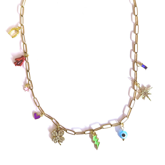 Gold necklace with various lucky charms on a white background